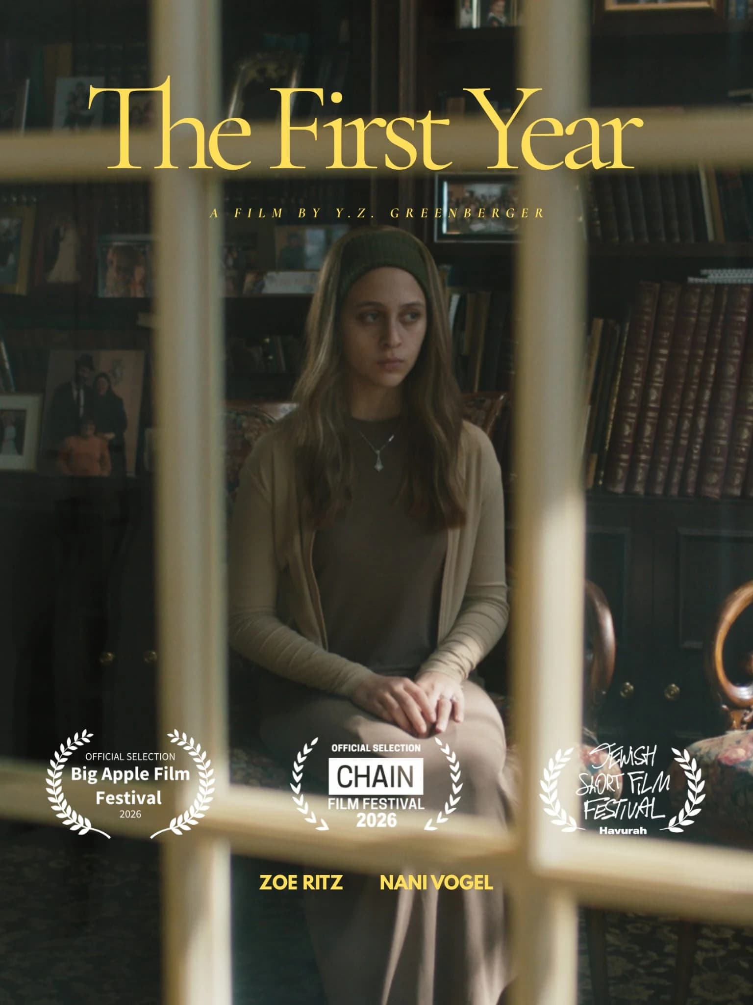 Poster for The First Year featuring a young woman seen through a window frame, with official selection laurels for the Big Apple, CHAIN, and Havurah Jewish Short film festivals